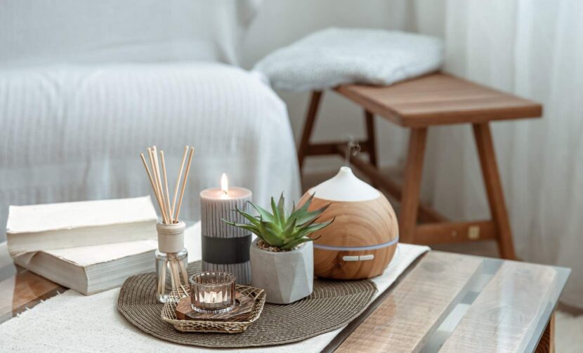 Create a wellness space at home with a comfortable chair, plants, and calming décor for relaxation and peace.